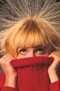 Lady with static electricity in her hair-15 Ways to Save on your Energy Bill Part 1-Allgeier Air-Louisville KY-265x400