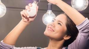 Woman changing lightbulb-Allgeier Air-Louisville KY-300x166jpg