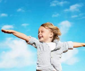 Boy smiling with arms out in clouds-The Importance of Indoor Air Quality-Allgeier Air-Louisville KY-300x251jpg