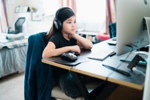 Female student at desk on computer-Allgeier Air-Louisville KY-300x200jpg 