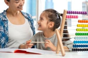 Mom and daughter working together- HVAC Tips To Avoid AC Repair For The School Year-Allgeier Air-Louisville KY-300x200jpg 
