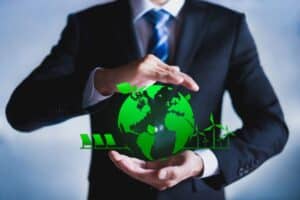 Man holding planet earth-Factors To Consider When Purchasing A New AC Unit-Allgeier Air-Louisville KY-600x400jpg 