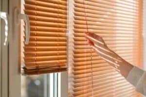 Closing blinds-How To Avoid Overworking Your AC Unit In A Heat Wave-Allgeier Air-Louisville KY-600x400jpg