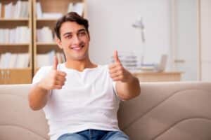 Sitting guy with thumbs up-Questions To Ask When Considering A New Air Conditioner-Allgeier Air-Louisville KY-600x400jpg 
